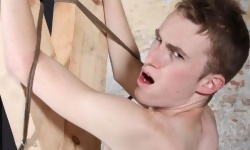Tied to Cross and Flogged