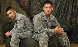 Specialist Ben Drills Airman Paolo
